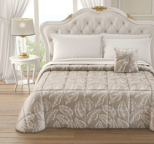 Trapunta Piumone Gemma in morbido velluto con lavorazione jacquard e cuscino arredo coordinato